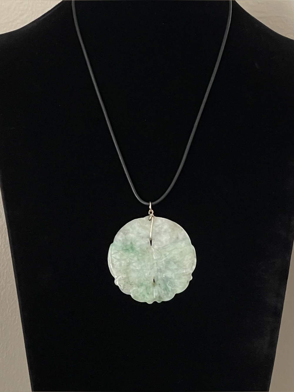 Carved jadeite double fish pendant.